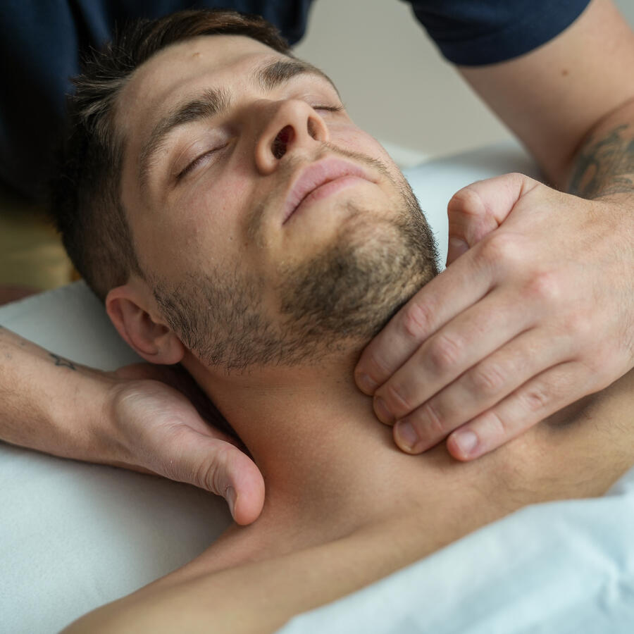 Vocal wellness massage in Port Moody by RMT Glenn McGarroch, supporting singers and voice professionals by reducing tension in jaw, tongue, throat, and breathing muscles.